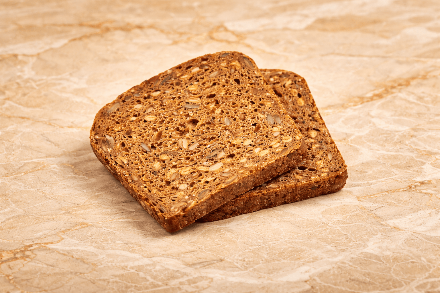 Gluten free sliced dark bread with pumpkin and lentils